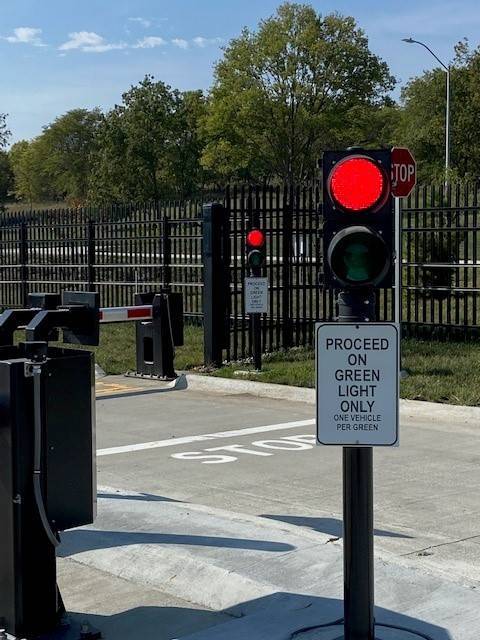 Crash-rated barrier arm at a site entrance