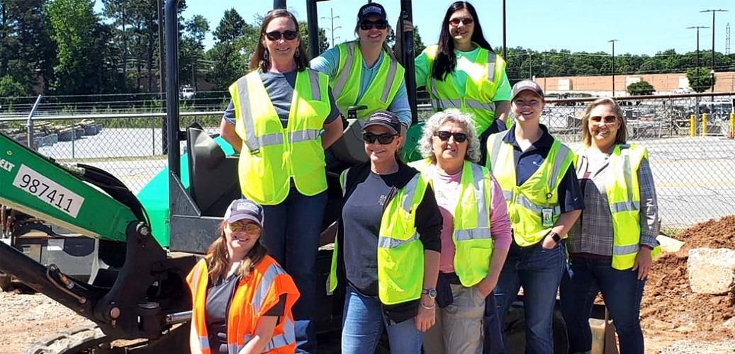 Langston Construction team members in high-visibility safety gear at a substation construction site